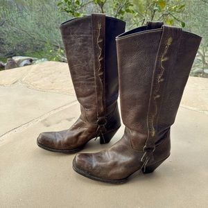 Cowboy boots with plant detailing up side and decorative tassel